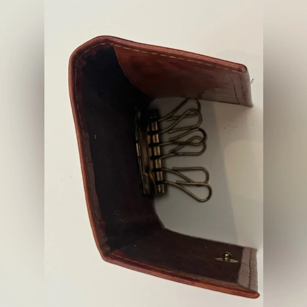 Vintage Rolf’s genuine pigskin billfold in original box